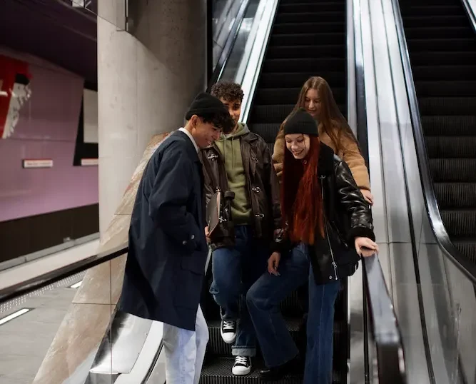 full-shot-happy-teens-stairs